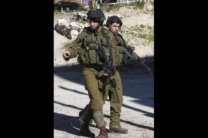 Israeli Occupation Forces raid and  arrest in the West Bank