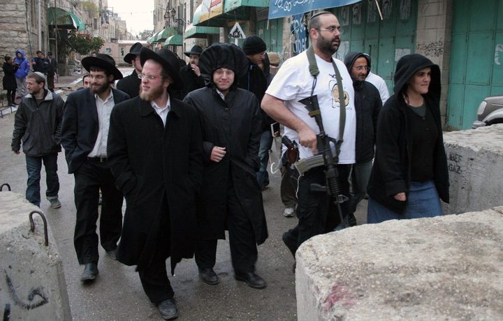 Israeli settlers attack a Palestinian from Mughayer