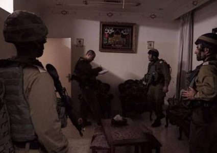 The occupation forces raided several Palestinian homes in Yatta