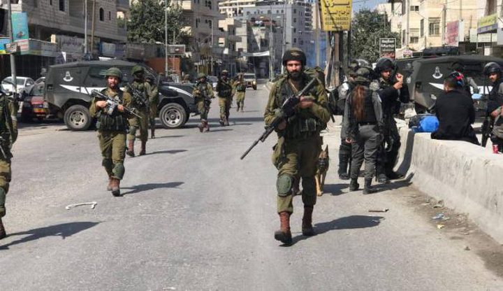 The occupation forces raid Qalandia camp and Kufr Aqab town