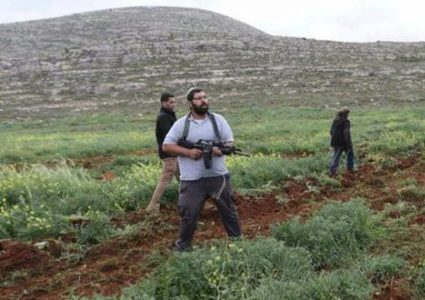 Israeli settlers prevent farmers from working in their lands