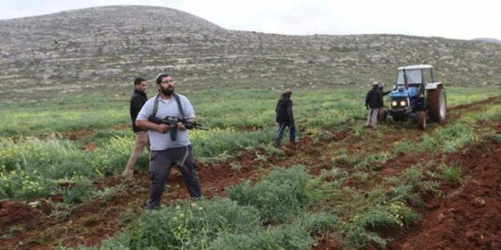 Israeli settlers prevent farmers from working in their lands