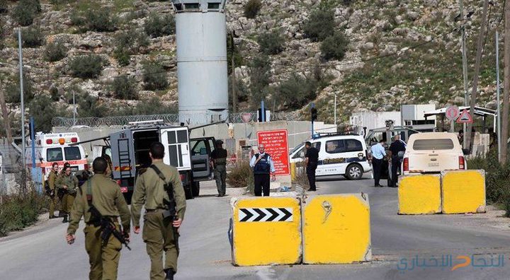 The Israeli occupation forces closed a road with cement blocks