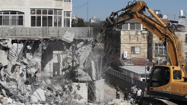 Palestinian family forced to demolish parts of own home
