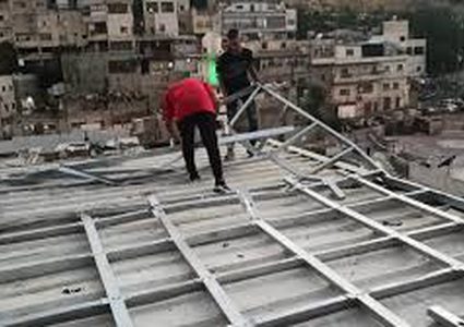 The occupation municipality forced a Palestinian to demolish his house personally