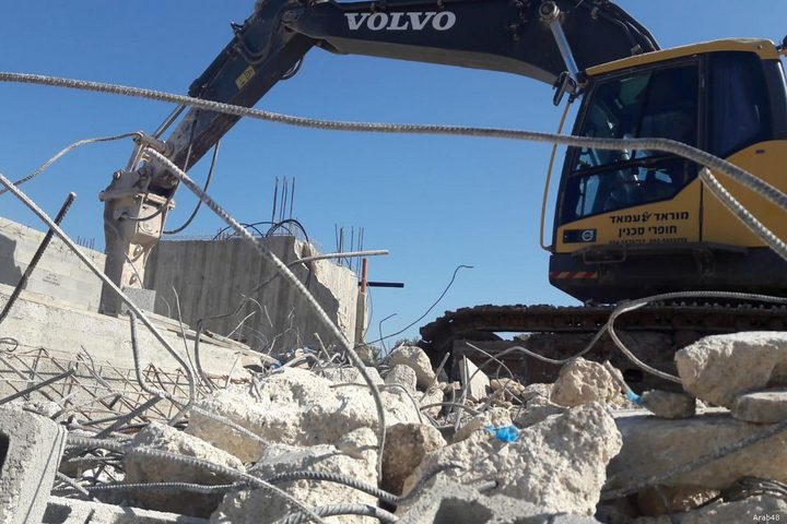 Palestinian family forced to demolish its own home