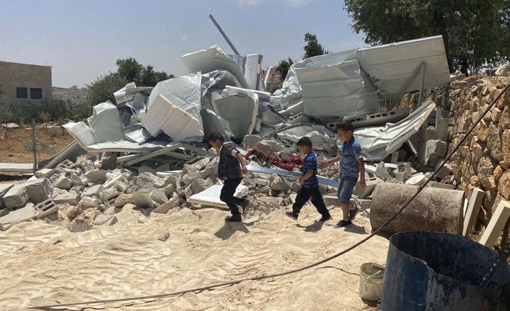 IOF demolish structures, remove electric poles in Hebron