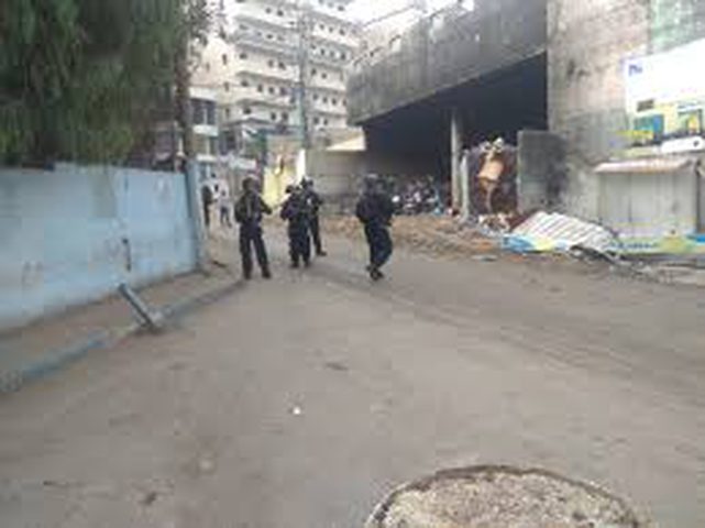 IOF assault residents with teargas during raids in Shuafat