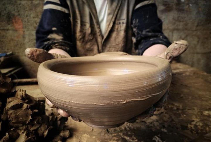 The manufacture of pottery vessels in various shapes and sizes at the "Suleiman Atallah" factory, east of Deir Al-Balah, in the middle of the Gaza Strip.