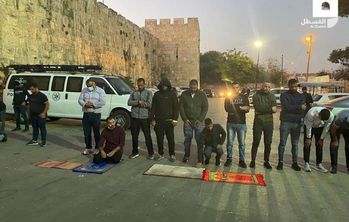 Protesting on occupation abuses…  prays are performed in front of AL-YOUSIFYA graveyard.